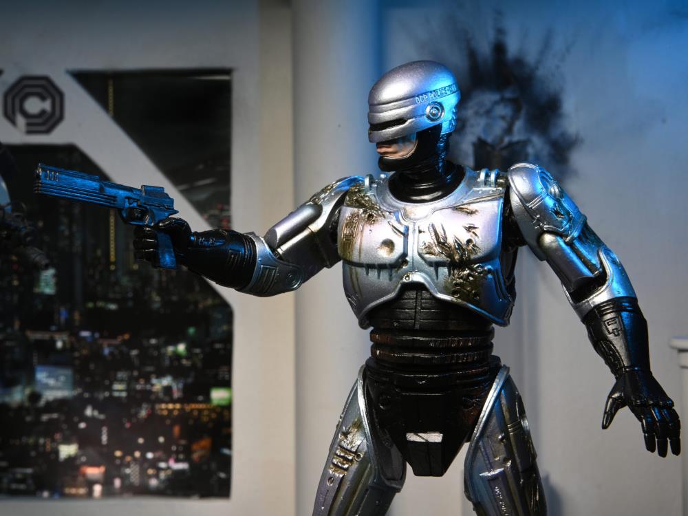 RoboCop Ultimate Battle Damaged RoboCop with Chair Figura Neca