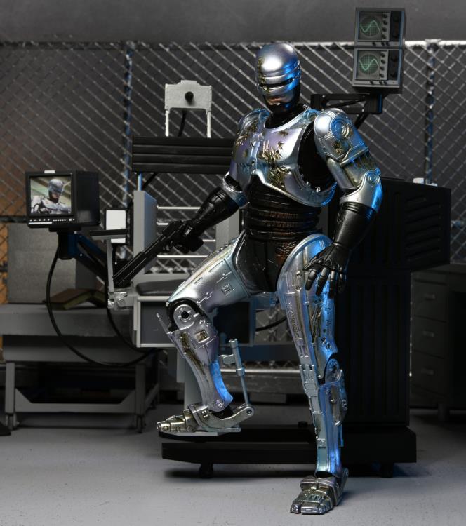 RoboCop Ultimate Battle Damaged RoboCop with Chair Figura Neca
