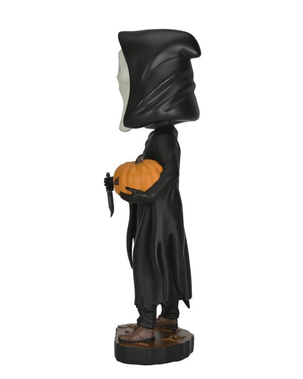 Ghost Face with Pumpkin Head Knockers