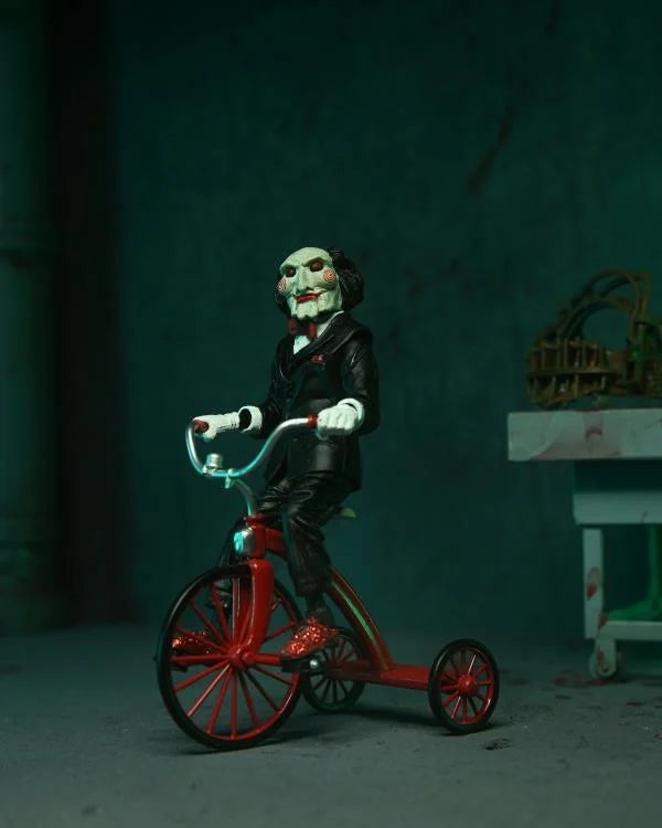 Saw Ultimate Jigsaw Killer (Red Robe) Figura de Acción