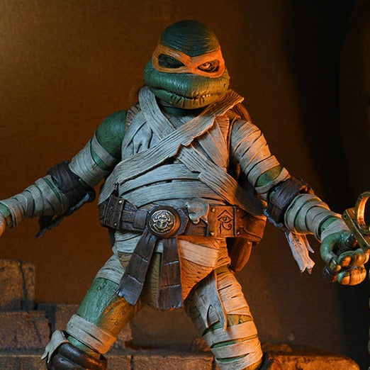 Universal Monsters x Teenage Mutant Ninja Turtles Ultimate Michelangelo as The Mummy Figura Neca